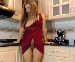 ¡Ay, Mami Big Cock Shemale Strokes a Stiff One in the Kitchen